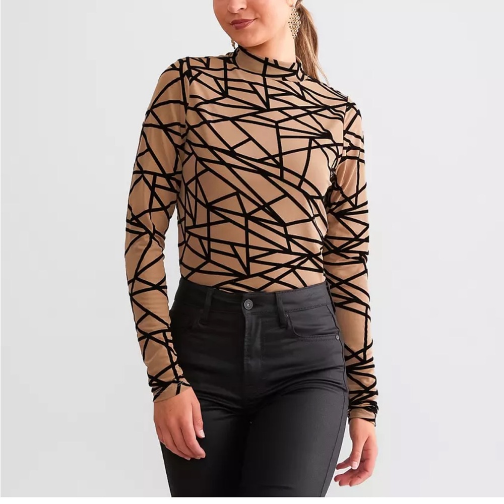 Tan and black flocked turtleneck